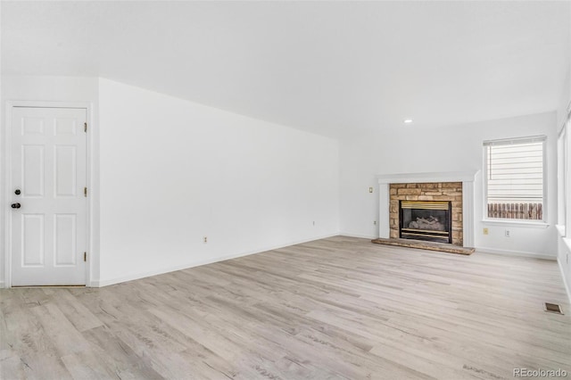 524 Rider Ridge Dr, Longmont, CO 80504 - unfurnished living room with wood finished floors, a fireplace, baseboards, and recessed lighting