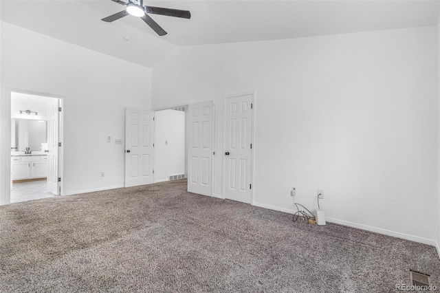 524 Rider Ridge Dr, Longmont, CO 80504 - unfurnished bedroom with carpet flooring, visible vents, baseboards, and high vaulted ceiling