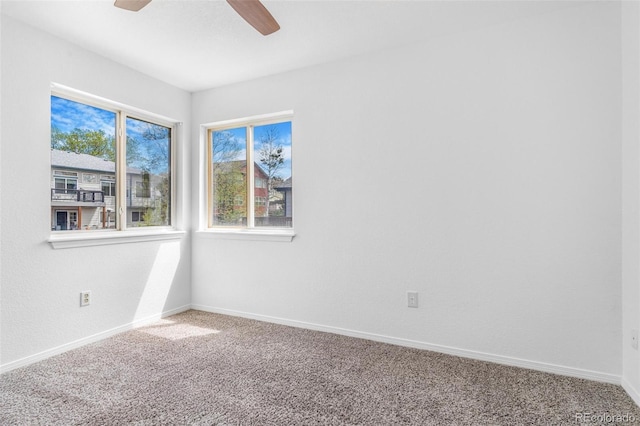 524 Rider Ridge Dr, Longmont, CO 80504 - carpeted empty room with a ceiling fan and baseboards