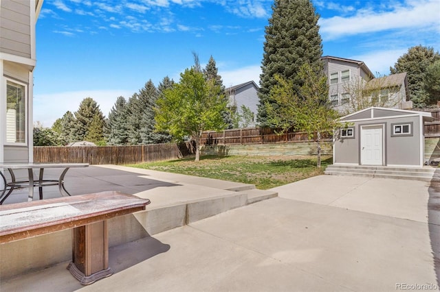 524 Rider Ridge Dr, Longmont, CO 80504 - view of patio featuring an outbuilding and a storage shed