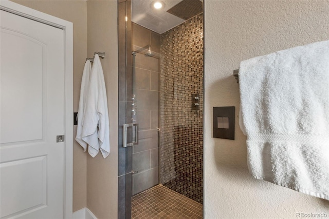 bathroom with an enclosed shower