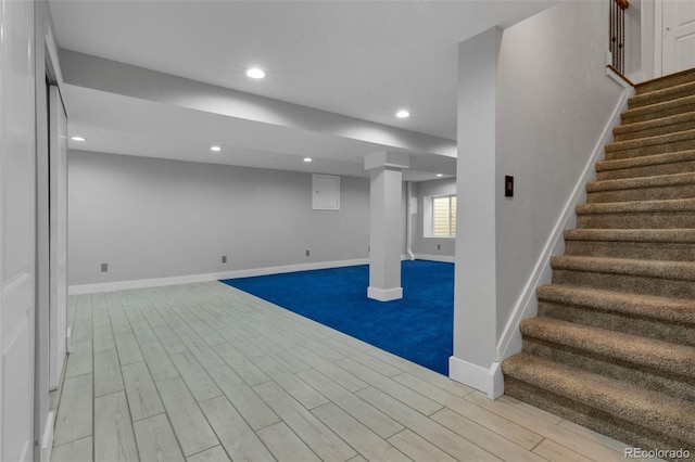 basement with light wood-type flooring