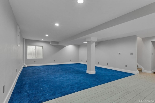 basement featuring carpet