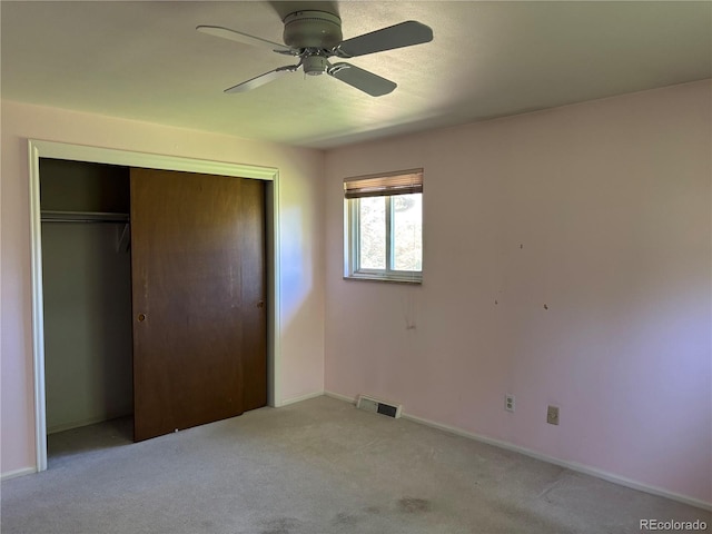 1602 S Lamar St, Lakewood, CO 80232 - unfurnished bedroom featuring a closet, baseboards, light colored carpet, and ceiling fan