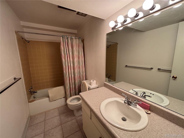 1602 S Lamar St, Lakewood, CO 80232 - bathroom with shower / tub combo with curtain, vanity, toilet, and tile patterned flooring