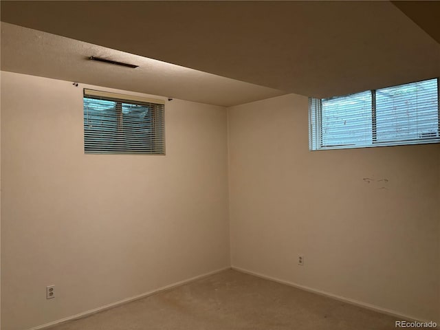 1602 S Lamar St, Lakewood, CO 80232 - spare room featuring light carpet and baseboards