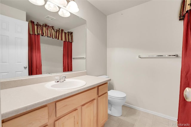 bathroom with visible vents, toilet, baseboards, a chandelier, and vanity