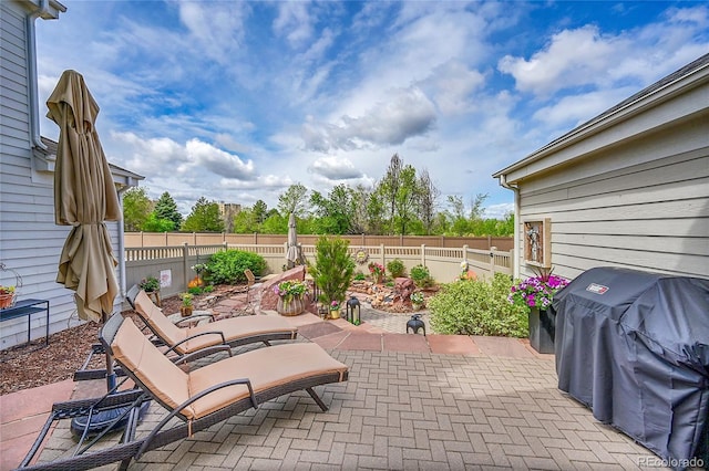 view of patio with a fenced backyard