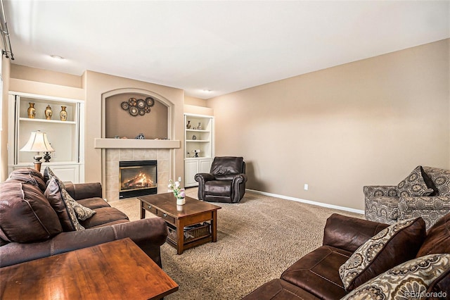 5569 S Helena St, Centennial, CO 80015 - living room featuring carpet, a fireplace, and built in shelves
