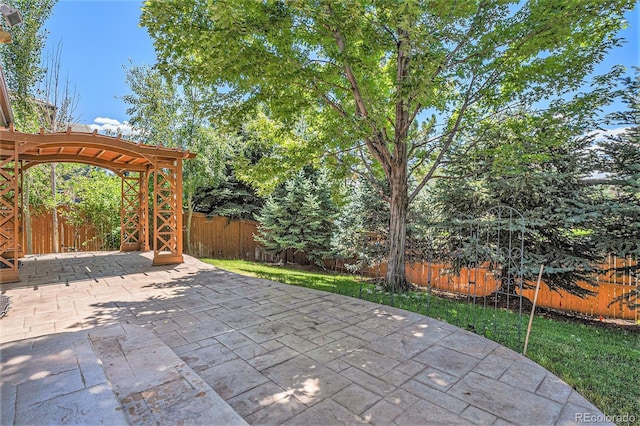 5569 S Helena St, Centennial, CO 80015 - fenced backyard with a patio area and a pergola