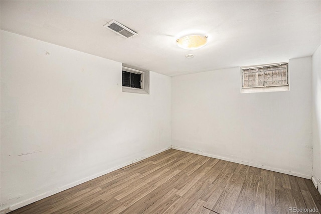 2526 W 39th Ave, Denver, CO 80211 - empty room featuring wood finished floors and baseboards
