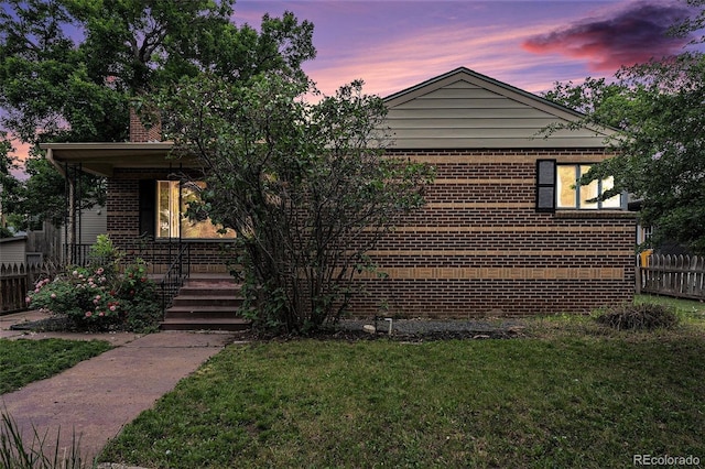 2526 W 39th Ave, Denver, CO 80211 - bungalow-style house featuring brick siding, a porch, and a chimney