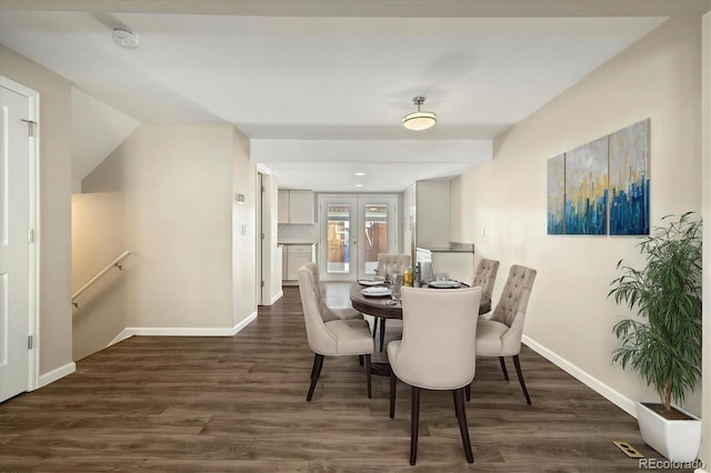 dining space featuring french doors, baseboards, and dark wood-style flooring