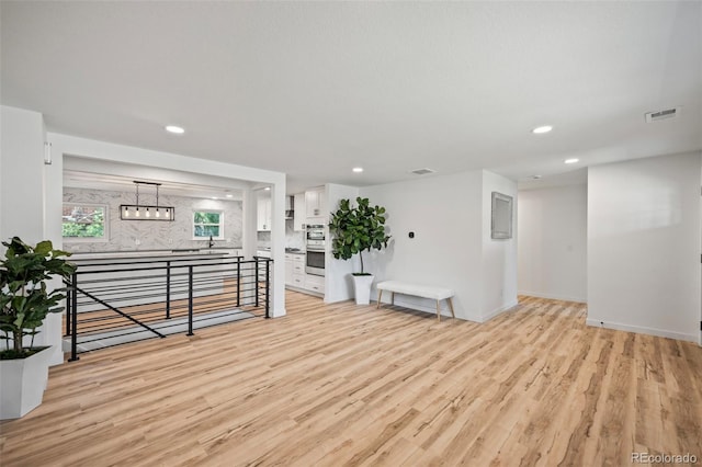 interior space featuring light hardwood / wood-style flooring and sink