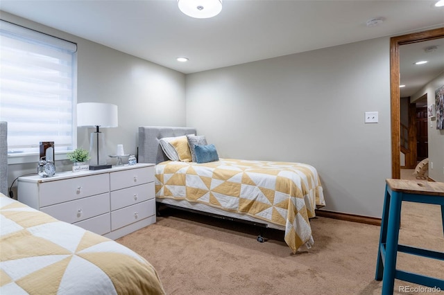 bedroom with light carpet