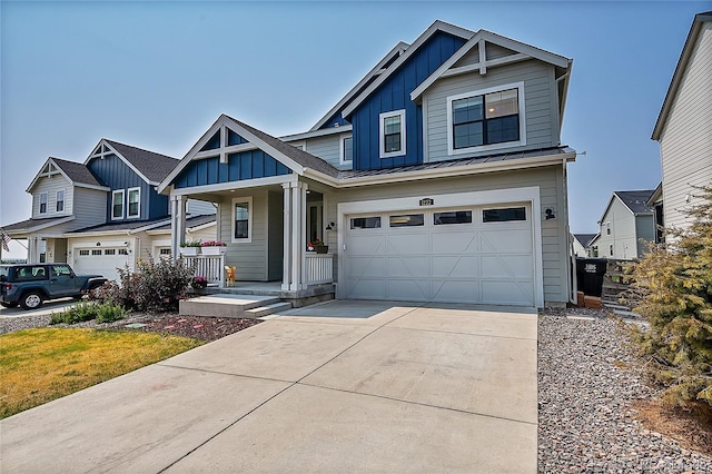 craftsman inspired home with a porch and a garage