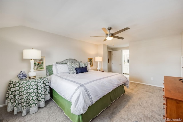 bedroom with lofted ceiling, ceiling fan, and carpet flooring