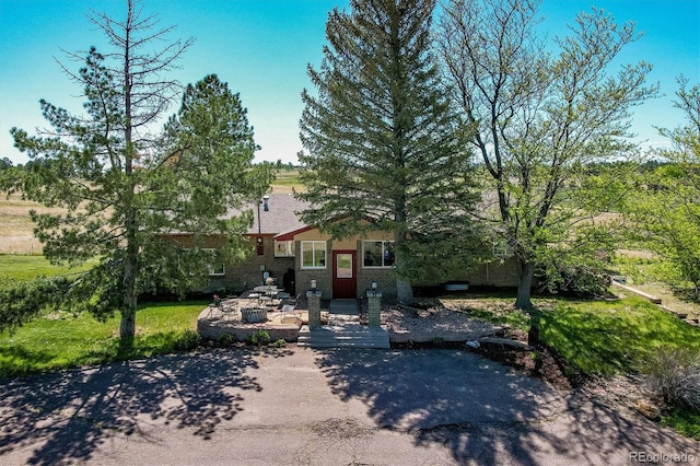 view of front of property featuring a patio