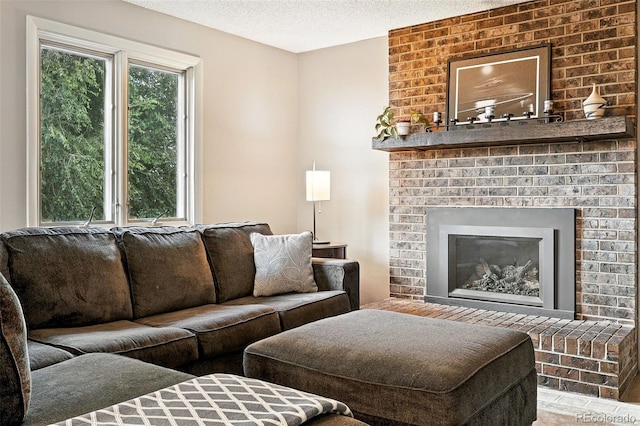 7830 Club Crest Dr, Arvada, CO 80005 - living room featuring a brick fireplace and a textured ceiling