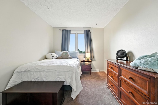 7830 Club Crest Dr, Arvada, CO 80005 - bedroom featuring dark colored carpet and a textured ceiling