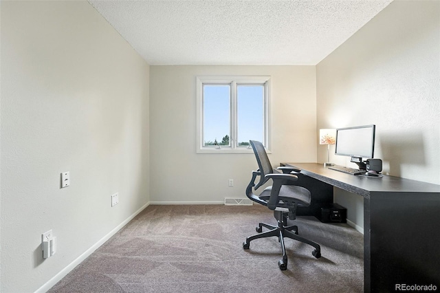7830 Club Crest Dr, Arvada, CO 80005 - carpeted office featuring baseboards and a textured ceiling