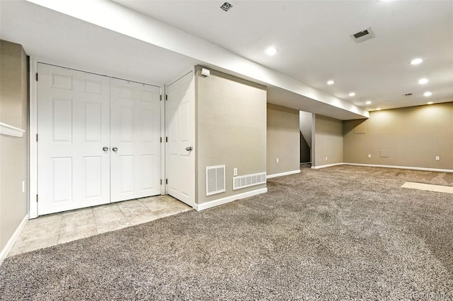 7830 Club Crest Dr, Arvada, CO 80005 - finished basement with carpet flooring, recessed lighting, and stairs