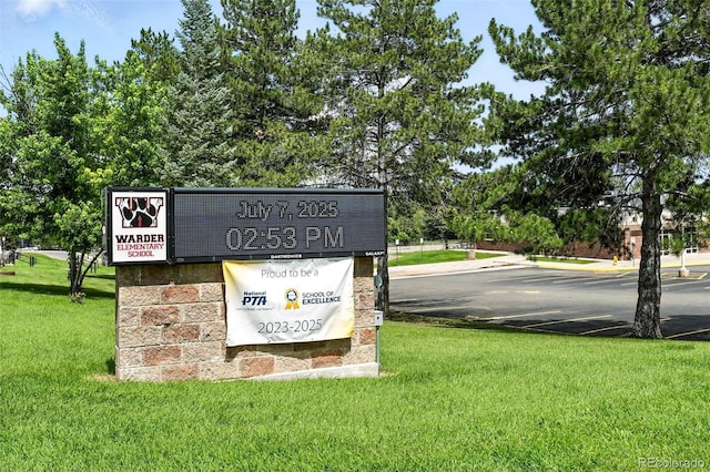 7830 Club Crest Dr, Arvada, CO 80005 - community sign with a lawn and uncovered parking