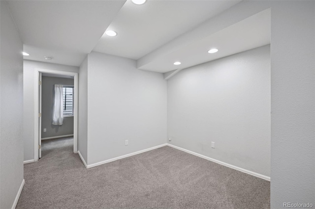 basement featuring recessed lighting, carpet, and baseboards