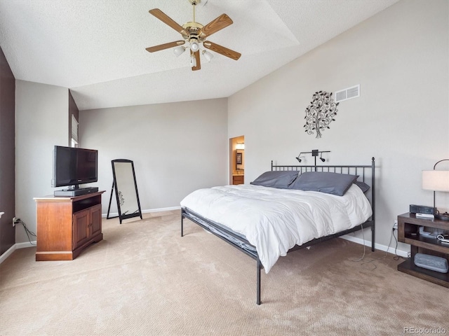 bedroom with baseboards, visible vents, light carpet, and lofted ceiling