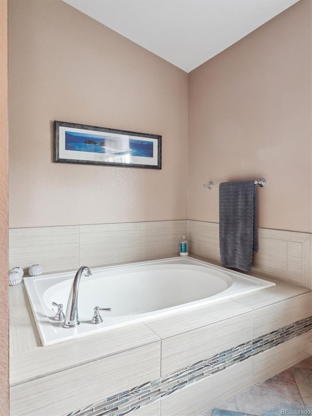 full bath featuring a garden tub