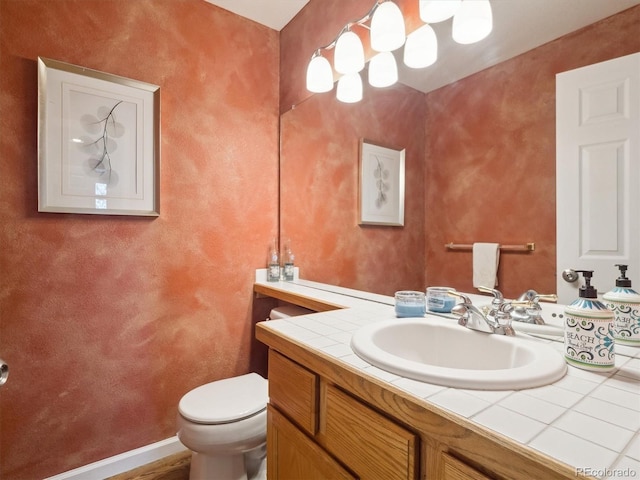 half bath with toilet and vanity