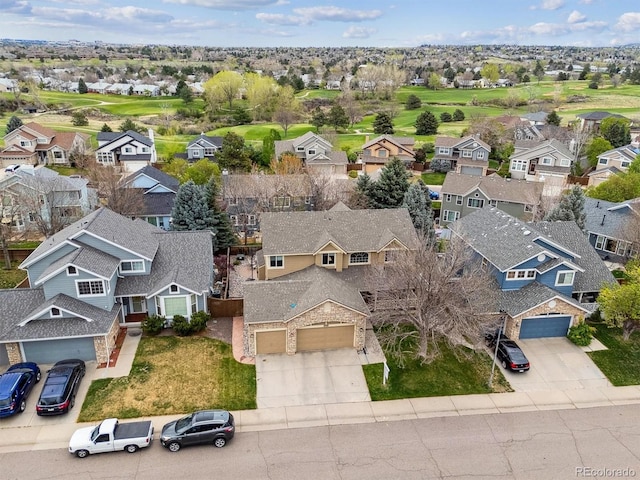 bird's eye view featuring view of golf course and a residential view