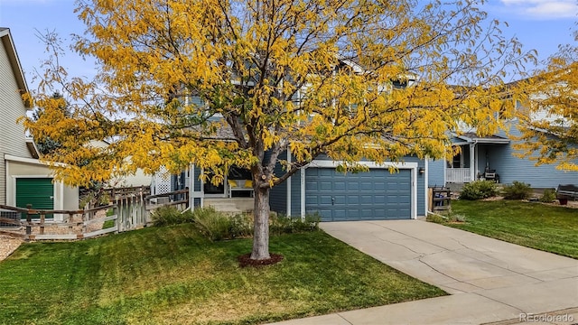 view of property hidden behind natural elements featuring a front yard