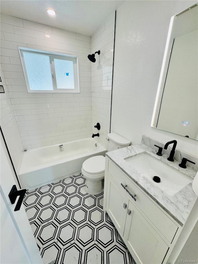 7126 Joan St, Denver, CO 80221 - full bathroom featuring vanity, bathtub / shower combination, and toilet