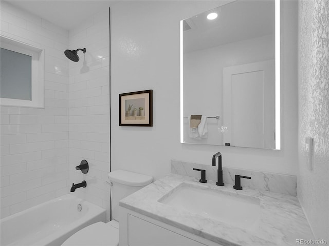 7126 Joan St, Denver, CO 80221 - full bathroom featuring vanity, toilet, and bathing tub / shower combination