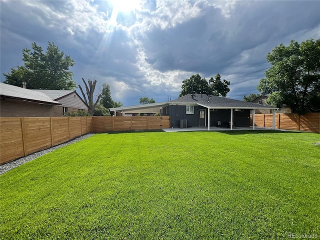 7126 Joan St, Denver, CO 80221 - view of yard featuring a patio area and central AC unit