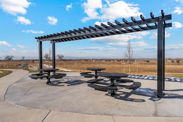 view of home's community featuring a patio and a pergola