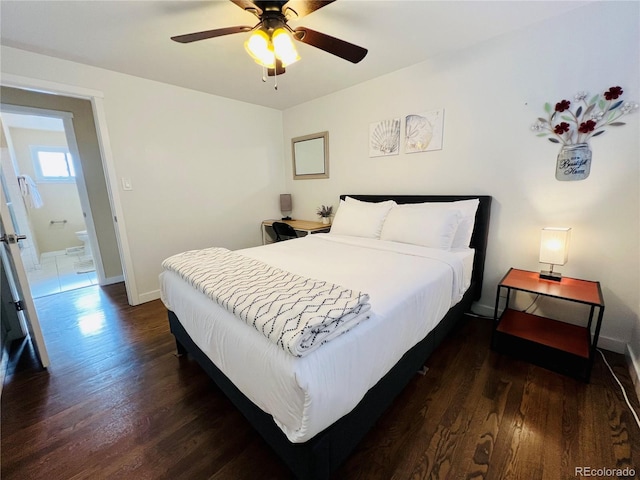 bedroom featuring ceiling fan, dark wood-style flooring, and baseboards