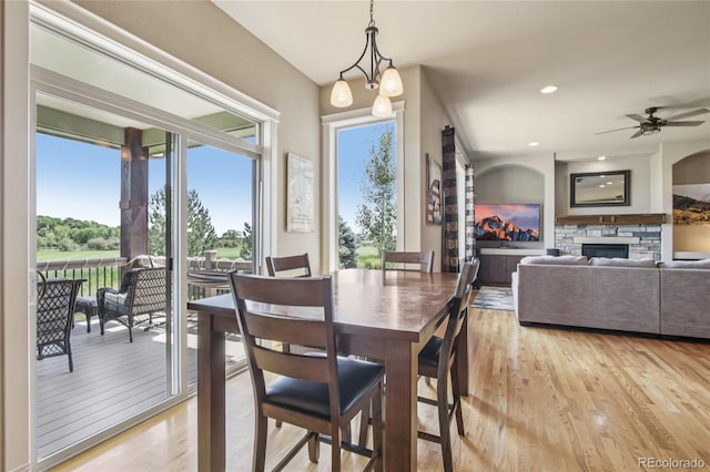 7258 Spanish Bay Dr, Windsor, CO 80550 - dining room with healthy amount of natural light, light wood-style flooring, ceiling fan, and recessed lighting