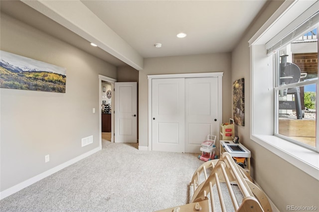 7258 Spanish Bay Dr, Windsor, CO 80550 - carpeted bedroom with a closet and recessed lighting