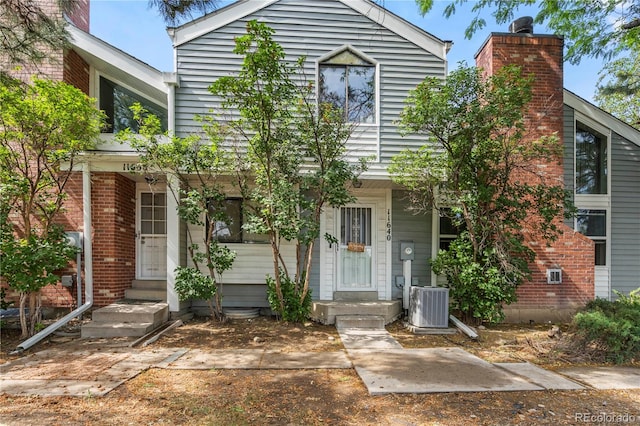 view of front of property with central AC unit