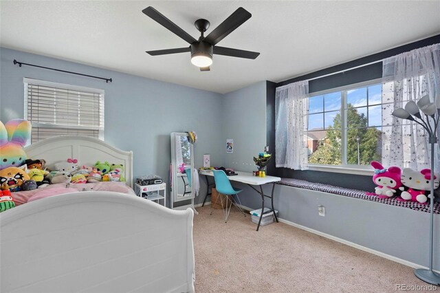 bedroom featuring carpet floors, baseboards, and ceiling fan