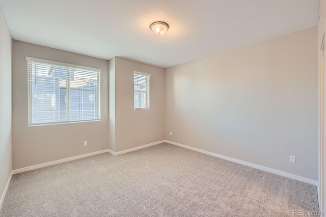 empty room with carpet floors