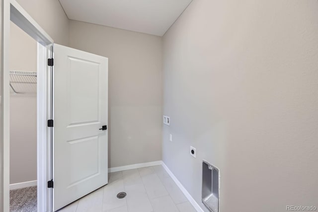 clothes washing area with hookup for a washing machine and hookup for an electric dryer