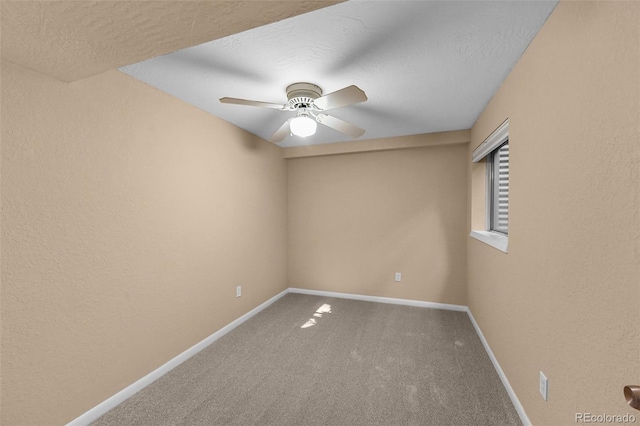 11704 Elk Head Range Rd, Littleton, CO 80127 - unfurnished room featuring carpet, a ceiling fan, and a textured wall