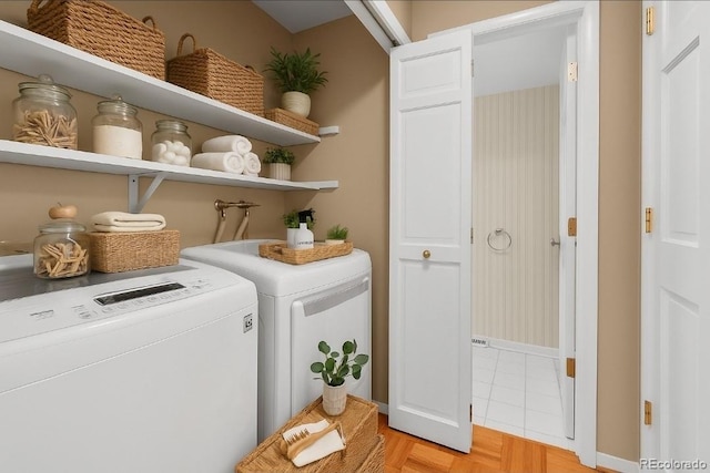 11704 Elk Head Range Rd, Littleton, CO 80127 - laundry room with washer and dryer and baseboards
