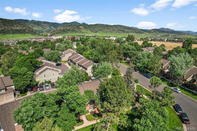 11704 Elk Head Range Rd, Littleton, CO 80127 - aerial overview of property's location with a mountain backdrop and nearby suburban area