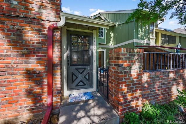 11704 Elk Head Range Rd, Littleton, CO 80127 - entrance to property featuring brick siding