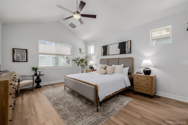 13736 Umatilla Ln, Broomfield, CO 80023 - bedroom with light wood-style floors, lofted ceiling, and a ceiling fan