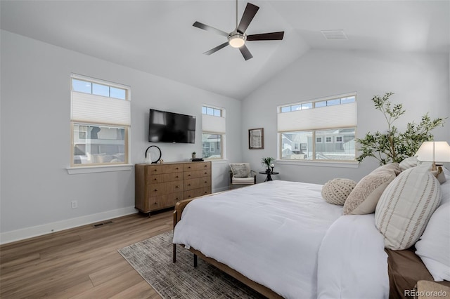 13736 Umatilla Ln, Broomfield, CO 80023 - bedroom with light wood-style floors, a ceiling fan, and high vaulted ceiling
